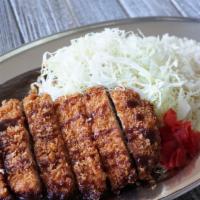 Pork Katsu Curry · Panko fried crispy pork cutlet curry with katsu sauce served with shredded cabbage, Fukujin-...