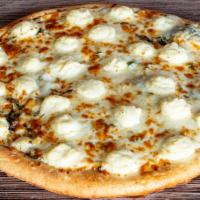 Wild White Pizza · Fresh Garlic, Fresh Basil, Parmesan & Mozzarella cheese over white sauce and topped with Ric...