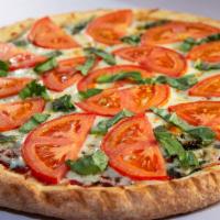 Margherita Pizza · Fresh basil, diced tomatoes, fresh garlic, and Mozzarella cheese.