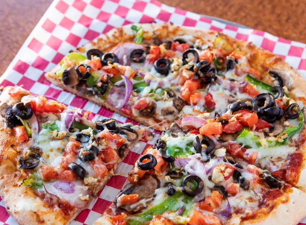 Veggie Pizza · Black olives, mushrooms, bell peppers, red onion, tomatoes, and fresh garlic.