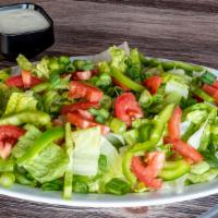 House Salad · Hearts of romaine, bell peppers, tomatoes, and green onions with your choice of dressing.