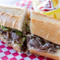 Philly Cheesesteak Sandwich · Fully charged bread with philly steak melted with mozzarella, onions, green peppers, and mus...