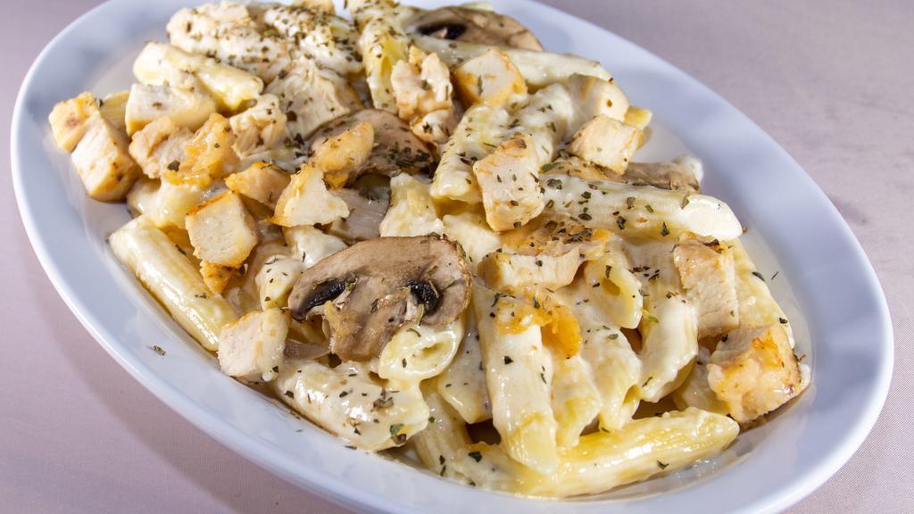 Chicken Penne Alfredo · Pieces of chicken, mushrooms, and alfredo sauce over penne pasta. All pasta dishes are served with garlic bread.