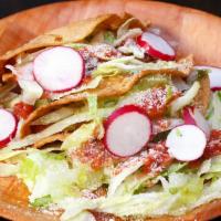 Crispy Tacos · Stewed & shredded blend of potatoes with beef, chicken or tinga.