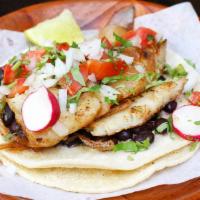 Shrimp or Fish Taco · Choice of meat, double tortilla, cilantro, onion.
