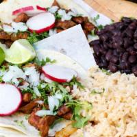 Panda Combo · 2 tacos or tamales with rice & beans & small salad.