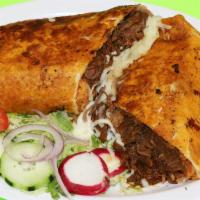 QuesaBirria Burrito · Quesabirria Burrito is exquisit, with its red-tinged flour tortilla, Rice, beans, cheese, Bi...