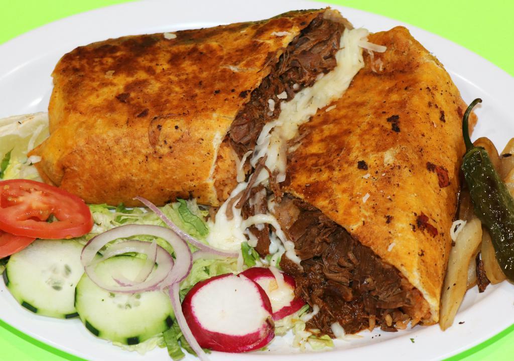 QuesaBirria Burrito · Quesabirria Burrito is exquisit, with its red-tinged flour tortilla, Rice, beans, cheese, Birria (Beef), more cheese, and more cheese.