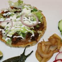 Sope  · A sope is a popular street snack. A sope is a handmade corn shell that we like to think of a...