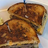 Patty Melt · Served on rye with grilled onions and your choice of swiss, cheddar, American or jack cheese.