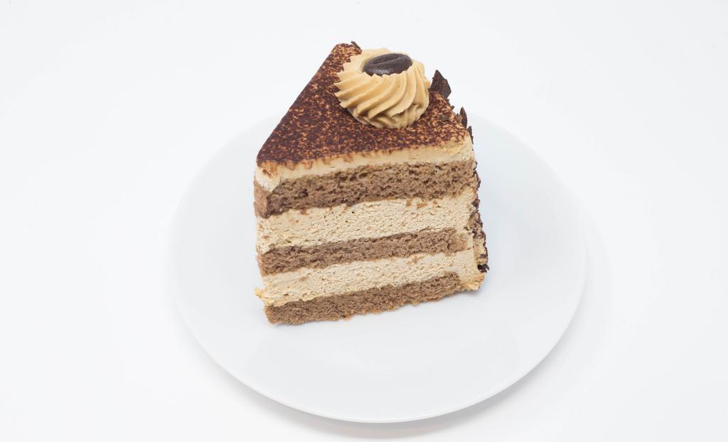 Cappuccino Cake Slice (6 Inch) · A Slice of Mocha-Chocolate Cake with a Blend of Mascarpone, Whipped Cream, and Coffee.