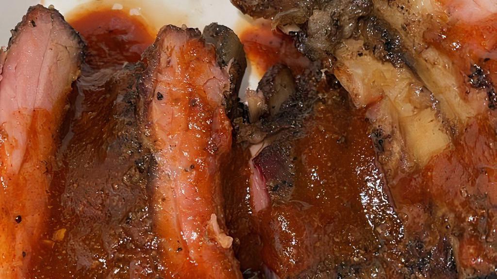 Baby Back Ribs · From the loin – Baby Backs are the leaner pork rib. We season simply and let the smoking process be part of the overall seasoning.