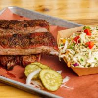 St. Louis Ribs · Pit master’s favorite rib... cut from the spare rib ( which comes from the belly.) The St. L...
