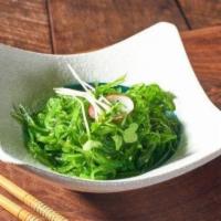 Wakame Salad · Marinated seaweed salad with sesame, garnished with baby bean sprout