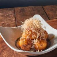 Tacoyaki · Deep-fried Round balls filled with minced octopus, topped with special takoyaki sauce, diced...