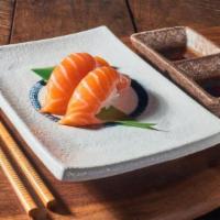 Sake (Salmon) nigiri · Rich, smooth orange meat fish topped on sushi rice