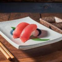 Maguro (Tuna) nigiri · Firm red meat fish topped on sushi rice