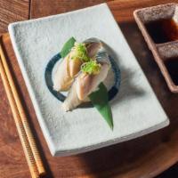 Saba nigiri · Slightly chewy fatty white meat fish topped on sushi rice