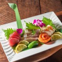 Sashimi Regular (12 pcs) · Chef's daily special choice of fresh sashimi (12pc)