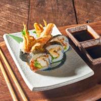 Spider Roll · Deep-fried soft shell crab , fresh avocado, cucumber and tobiko roll