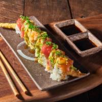 Rainbow Roll · Shrimp tempura and fresh cucumber roll, topped with assorted fishes and fresh avocado, garni...
