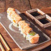 49ers Roll · Fresh avocado and cucumber roll, topped with salmon and thin slices of lemon