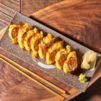 Golden Spicy Tuna Roll · Deep-fried Spicy tuna roll topped with spicy mayo sauce