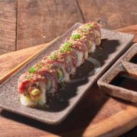 Chef Roll · Lightly smeared marbled Wagyu beef on top of fresh avocado, salmon and imitation crab meat r...