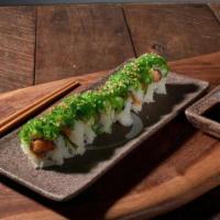 Swamp Roll · Spicy tuna roll, topped with seaweed salad and roast sesame
