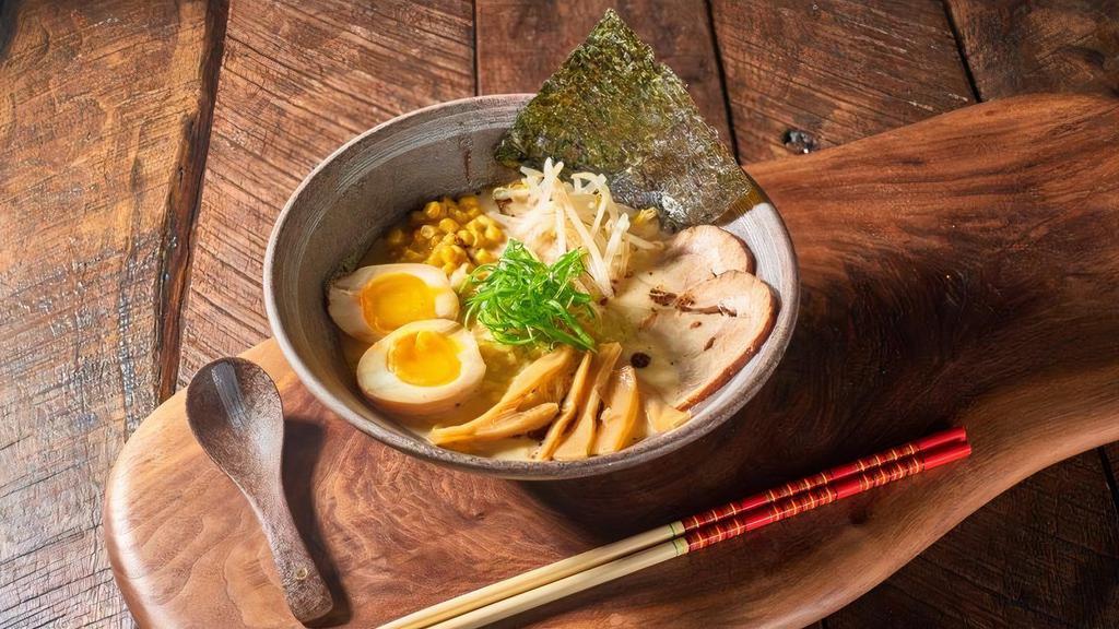 Tonkatsu Ramen · Cha-shu, soft boiled egg, bamboo shoots, corn, seasonal vegetable , green scallion and seaweed in pork bone soup
