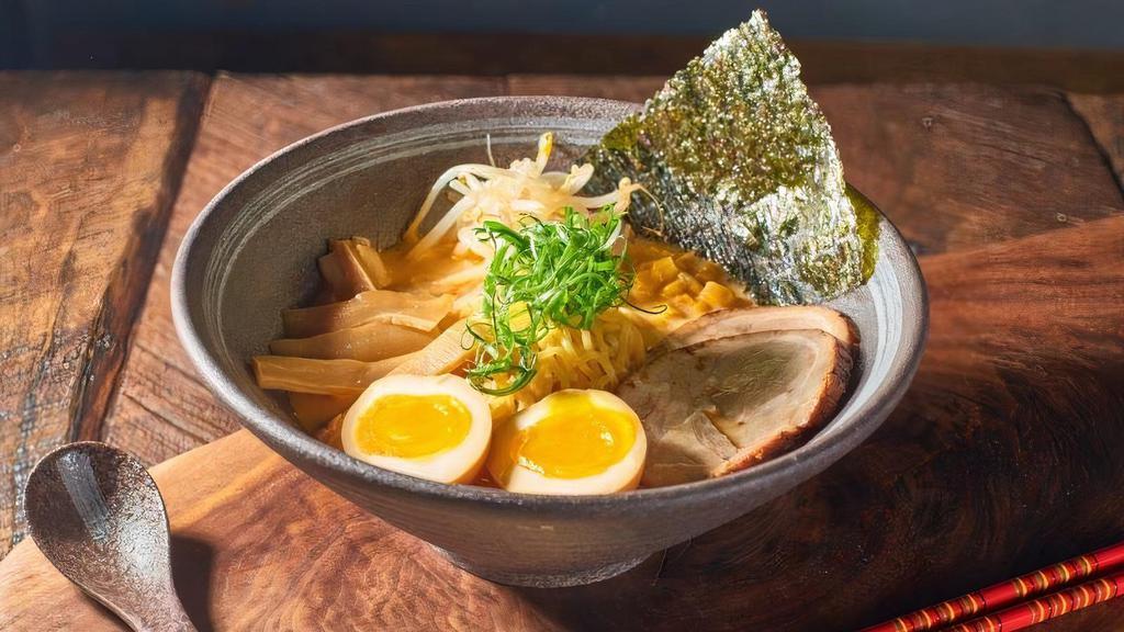 Spicy Miso Ramen · Cha-shu, soft boiled egg. corn, bamboo shoots, seasonal vegetable , green scallion and seaweed in pork bone soup