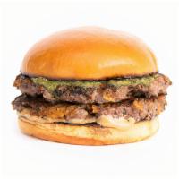 The Reggiano Burger · Smashed Double Patties, Parmesan Cheese, Bacon, Pesto, Balsamic Sauce on a Squishy Bun.