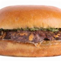 The Reggiano Burger (Single) · Smashed Patty, Parmesan Cheese, Bacon, Pesto, Balsamic Sauce on a Squishy Bun.