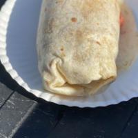 Breakfast Burrito  · Include eggs, your choice of mean, rice, beans, potatoes, onions & cilantro, and salsa.