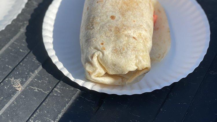 Breakfast Burrito  · Include eggs, your choice of mean, rice, beans, potatoes, onions & cilantro, and salsa.