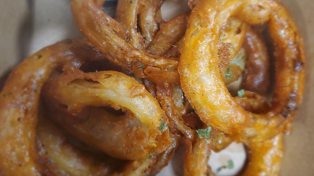 Beer Battered Onion Rings · Served with Ranch.