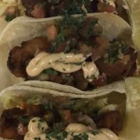 Beer Battered Fish Tacos (3) · Topped with chipotle coleslaw.