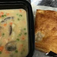Chicken Pot Pie · Breast meat chicken with carrots,mushrooms,onions and peas in cream sauce topped with puff p...