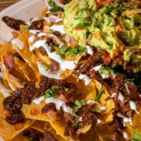 Loaded Nachos · Nacho Cheese | Shredded Cheese Blend | Guacamole | Pinto Beans | House Made Salsa | Pickled ...