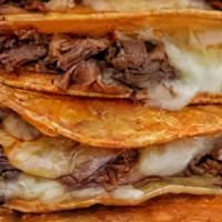 Short Rib Birria Tacos (2) · Melted Cheddar & Jack Cheese Blend | Side of Tomatillo Salsa