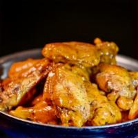 Traditional Wings (10) · Choose one or two sauces and a dip.