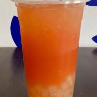 Pog Iced Tea · Passionfruit, orange, and guava flavored iced Jasmine green tea (sweentened)