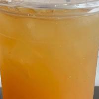 Lilikoi Lychee Iced Tea · Passionfruit and lychee flavored iced jasmine green tea (sweetened)