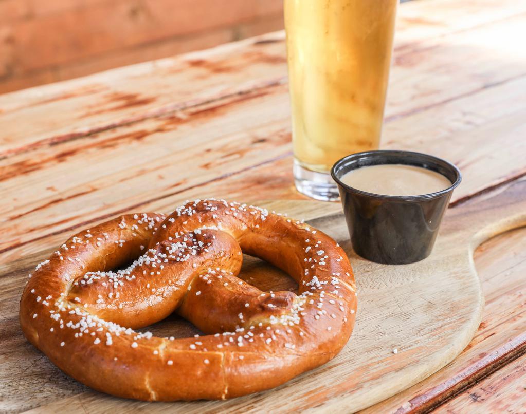 Giant Bavarian Pretzel · Served with our house-made beer/cheese fondue.