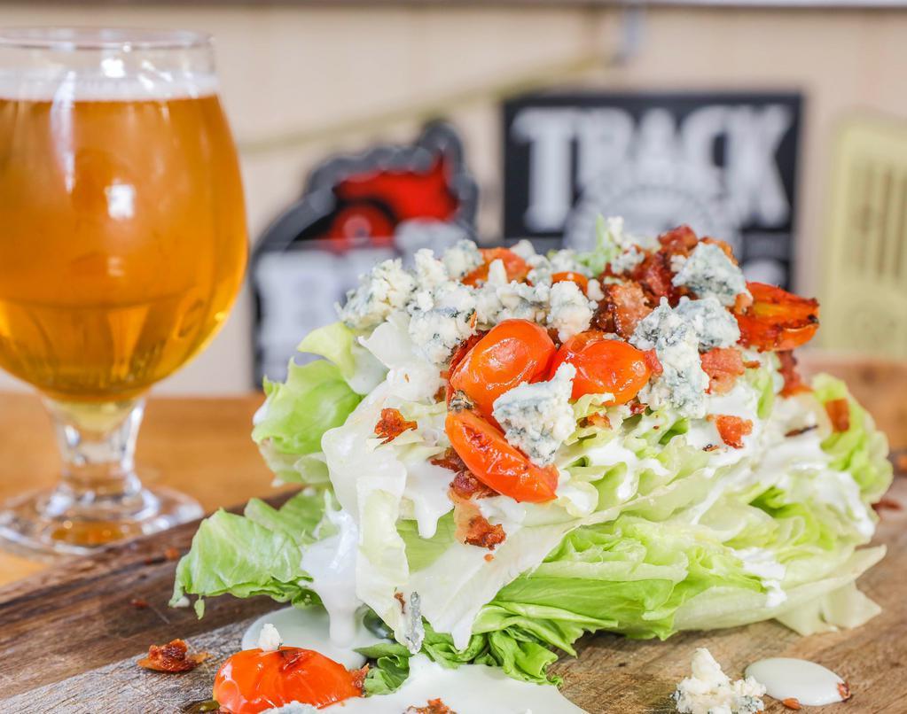 The Wedge · Iceberg lettuce with bacon bits, grilled grape tomatoes and topped with Point Reyes blue cheese dressing & crumbles. Add Tri-Tip, Chicken, Bacon for an additional charge.