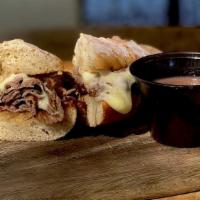 Mckay's Tridip Sandwich  · Marinated tri-tip sliced thinly & served on a Salt Craft roll with caramelized onion aioli, ...