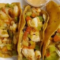 Taco gobernador · Corn tortillas,shrimp,bell pepper,onion,tomato and special sauce