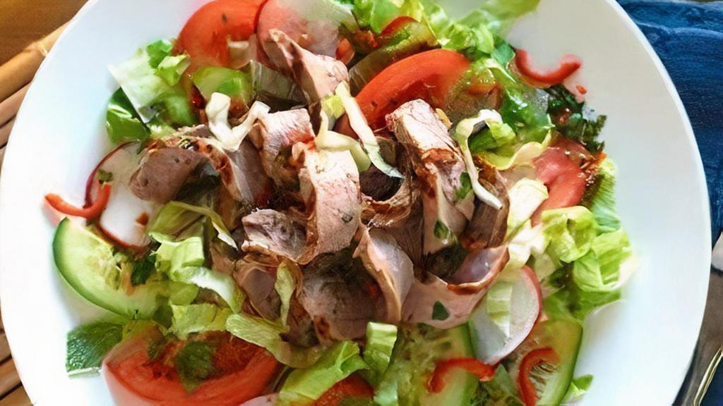 * Beef Salad · Spicy. Grilled beef and thinly sliced tossed with lime dressing, ginger, red onion and thai chili.