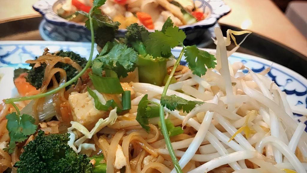 Pad Thai Veg · Stir fried rice noodles with egg or without egg, tofu, bean sprouts, ground peanut and green onion.