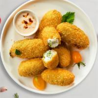 Jalapeño's Jurisdiction · Fresh jalapenos coated in cream cheese and fried until golden brown.